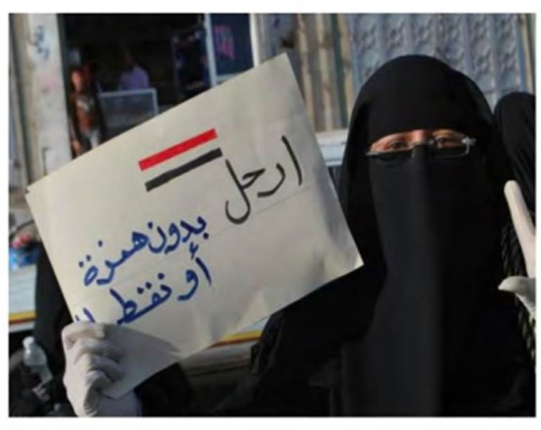 A person wearing a black veil holding a signAI-generated content may be incorrect.